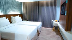 Photo de la galerie de l'établissement Sunrise Hotel Mojokerto, à Mojokerto