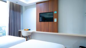 Photo de la galerie de l'établissement Sunrise Hotel Mojokerto, à Mojokerto 51 autres photos