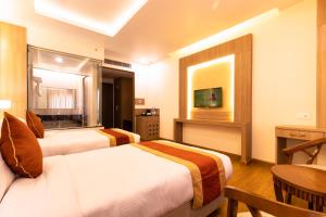 Letto o letti in una camera di Landmark Kathmandu