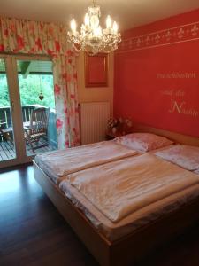 Postel nebo postele na pokoji v ubytování Apartment Christopherhof 56 Grafenwiesen
