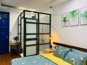 Postel nebo postele na pokoji v ubytování Sunny Hanoi Homestay