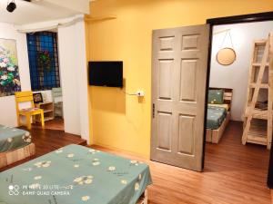 Postel nebo postele na pokoji v ubytování Sunny Hanoi Homestay