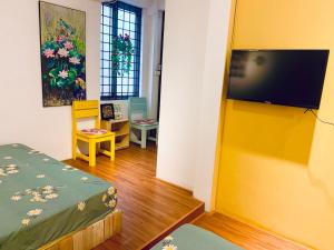 TV a/nebo společenská místnost v ubytování Sunny Hanoi Homestay