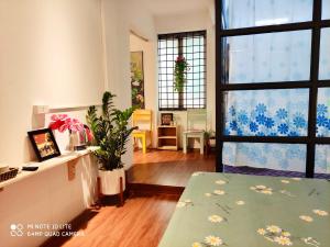 Postel nebo postele na pokoji v ubytování Sunny Hanoi Homestay