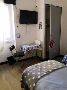 Postel nebo postele na pokoji v ubytování Hotel Ô Fil de L'ô