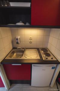 Kuchyň nebo kuchyňský kout v ubytování Résidence Les Académies Aixoise + 37 fotografií