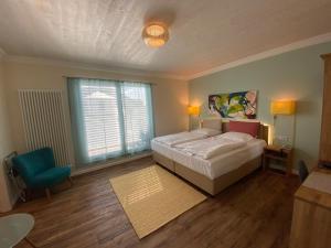 Postel nebo postele na pokoji v ubytování Hotel Hessischer Hof + 16 fotografií