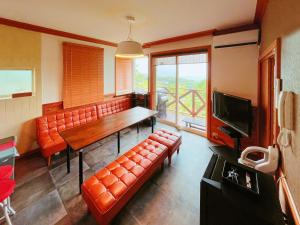 Televisyen dan/atau pusat hiburan di Suite Villa Ocean Terrace Atami