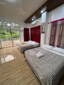 Кровать или кровати в номере Kiliog Valley Inn / Spacious House