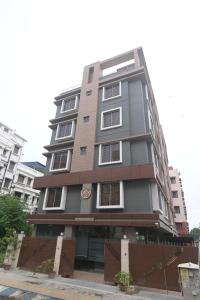 a tall building in a city at NK7 AL Newtown in Kolkata