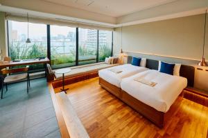 Una cama o camas en una habitación de Hamacho Hotel Tokyo