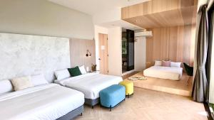 Postel nebo postele na pokoji v ubytování AiMen Homestay