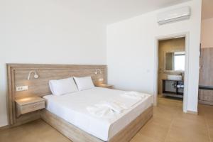 Postel nebo postele na pokoji v ubytování Bella Karpathos Villas