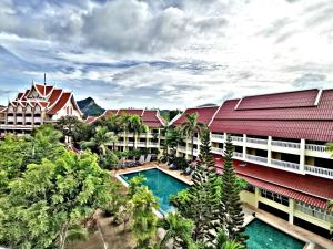 an aerial view of a resort with a swimming pool at MW Krabi Beach Resort -Family run- SHA Extra Plus in Ao Nang Beach