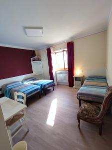 Ένα ή περισσότερα κρεβάτια σε δωμάτιο στο B&B Vista Casentino