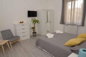 A television and/or entertainment centre at Casa e Appartamenti per Vacanze Jenner