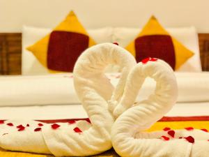 מיטה או מיטות בחדר ב-Seeming Lodge