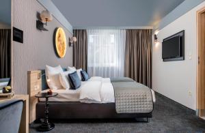 Posteľ alebo postele v izbe v ubytovaní Leonardo Boutique Hotel Krakow Old Town