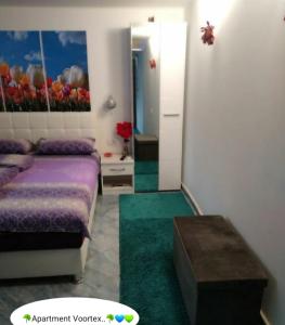 Postel nebo postele na pokoji v ubytování Apartment Voortex