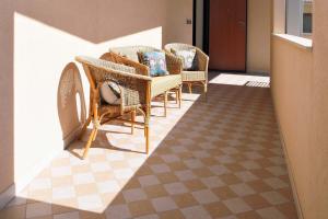 Posedenie v ubytovaní CASA LUCA Appartamento al centro di Marzamemi vista mare con parcheggio privato