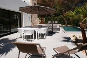 The swimming pool at or close to Extravagant Ibiza Villa Casa Tranquila Sargamassa 5 Bedrooms Fantastic Sea Views Private Pool Santa Eulalia