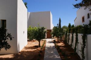 A garden outside Extravagant Ibiza Villa Casa Tranquila Sargamassa 5 Bedrooms Fantastic Sea Views Private Pool Santa Eulalia