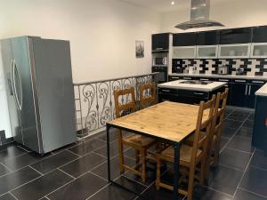 Kuchyňa alebo kuchynka v ubytovaní Villa Tenjin Chambre 17