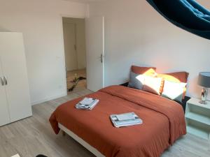 Posteľ alebo postele v izbe v ubytovaní Villa Tenjin Chambre 17