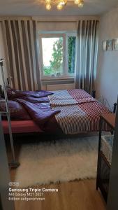 Ένα ή περισσότερα κρεβάτια σε δωμάτιο στο Ferienwohnung 43qm Torf 10 nähe Möhnesee