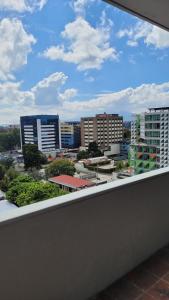 Nespecifikovaný výhled na destinaci Guatemala nebo výhled na město při pohledu z apartmánu