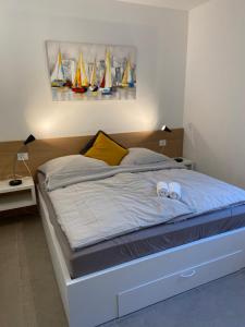 Ένα ή περισσότερα κρεβάτια σε δωμάτιο στο Apartment Lucie
