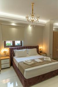 Posteľ alebo postele v izbe v ubytovaní AGORA luxury BOUTIQUE HOTEL