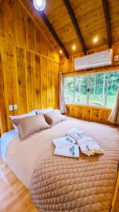 Postel nebo postele na pokoji v ubytování Cabanas Imbuia