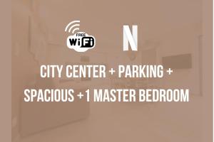 a sign that says the wfd city center parking and spontaneous i master bathroom at Centre Historique- FREE Parking-WIFI-CAMPAGNE CHIC- SLEEPNTRIPBEZIERS in Béziers