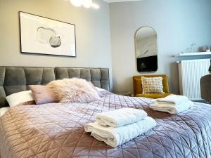 Ένα ή περισσότερα κρεβάτια σε δωμάτιο στο Pinea Premium 4YOU