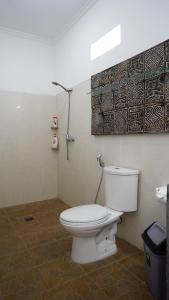 Koupelna v ubytování Canggu - Pererenan Guesthouse " aBaliHouse "