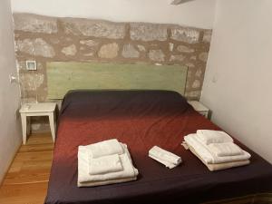 Postel nebo postele na pokoji v ubytování Residenza A Cova