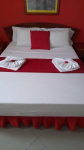 Cama ou camas em um quarto em Royal Mindelo Suite