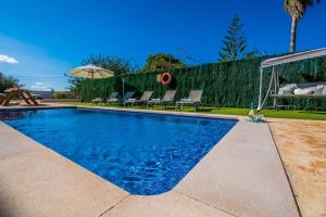 The swimming pool at or close to Ideal Property Mallorca - Can Micalo