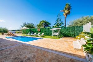 The swimming pool at or close to Ideal Property Mallorca - Can Micalo