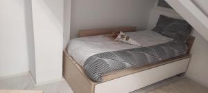 Postel nebo postele na pokoji v ubytování Divcibare As apartmani