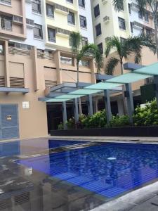 Gallery image of Cute and Cozy 2-bedroom condo with pool, gym and can cook in Manila