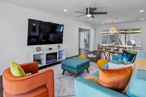 TV o dispositivi per l'intrattenimento presso The Desert Xscape Pool & Views