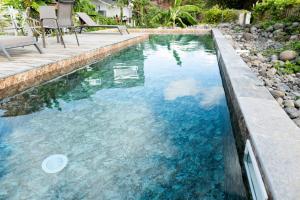 Fotografie z fotogalerie ubytování T2 chaleureux & piscine en pleine nature v destinaci Petit-Canal