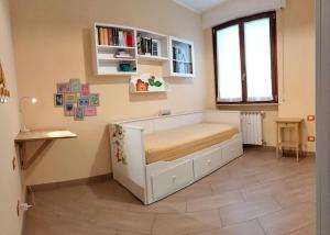 Кровать или кровати в номере Sunnyside Accademia