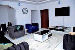 Zona de estar de Frankie’s Place: A spacious 4-bedroom home