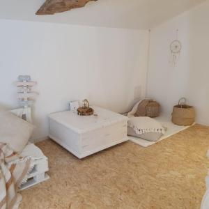 Rúm í herbergi á Cottage chaleureux dans un Domaine d'exception