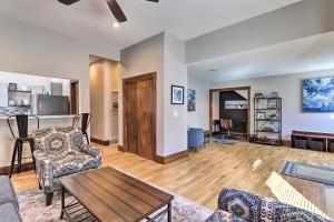 a living room with a couch and a table at Updated Denver Townhome Less Than 1 Mi to St Josephs in Denver