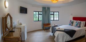Postel nebo postele na pokoji v ubytování Fairy Knowe Hotel