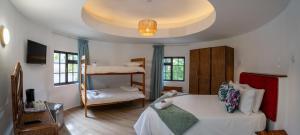 Postel nebo postele na pokoji v ubytování Fairy Knowe Hotel